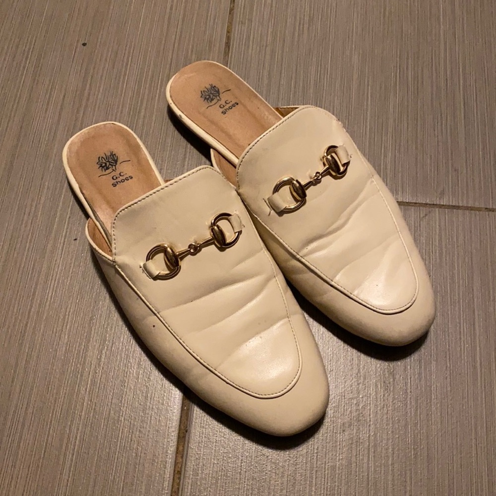 Cream colored horse bit loafers